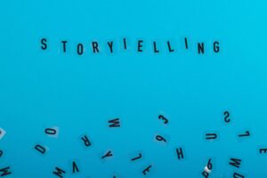 Storytelling is written on a light blue background among black letters. Marketing and content