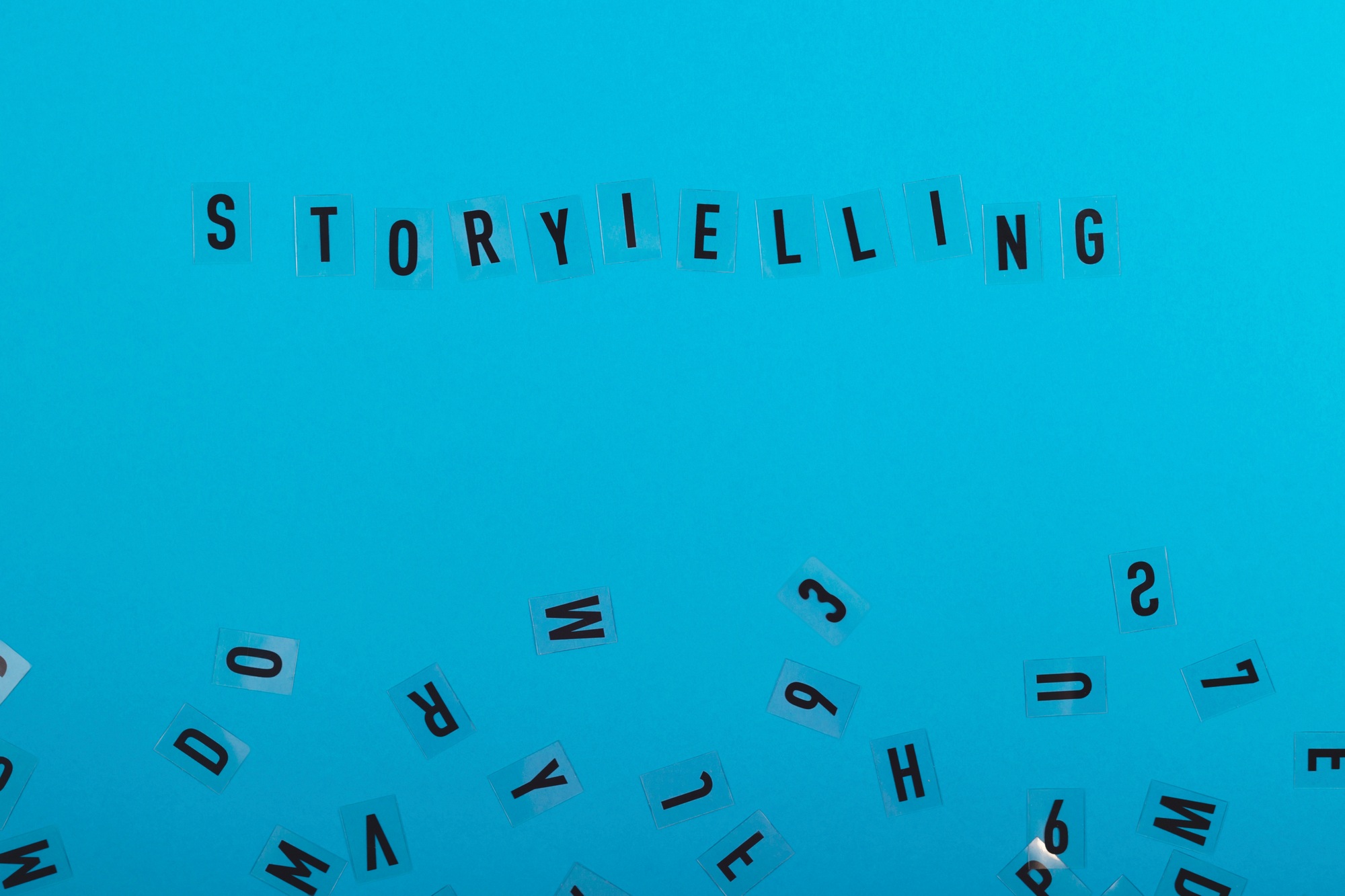 Storytelling is written on a light blue background among black letters. Marketing and content